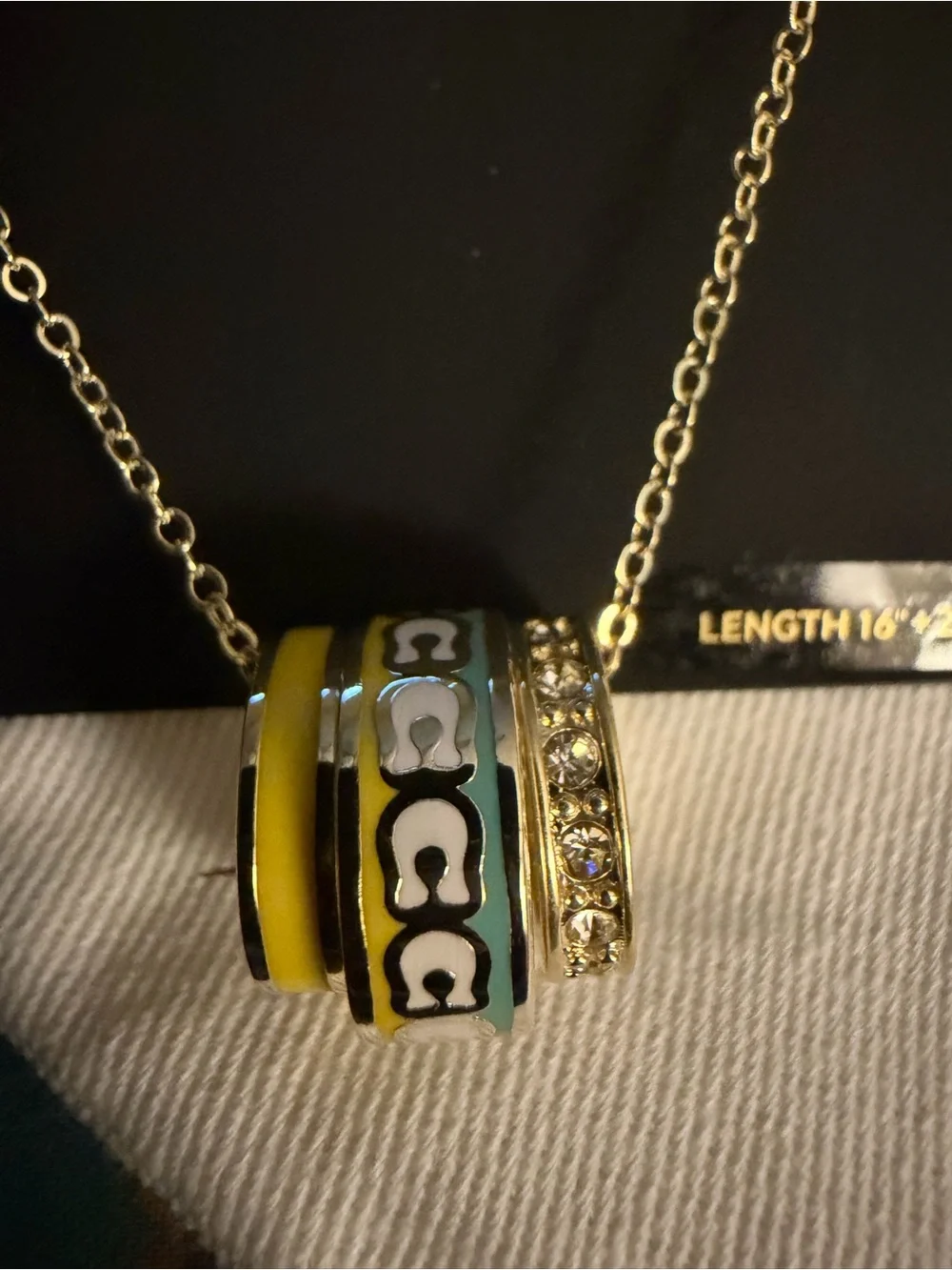 COACH Gold-Tone Yellow and Green Enamel Ring Pendant Necklace